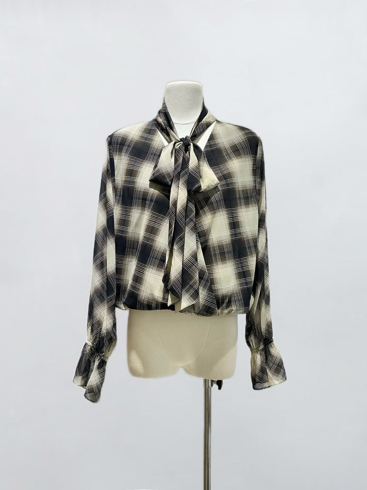 Blouse à carreaux avec nœud
